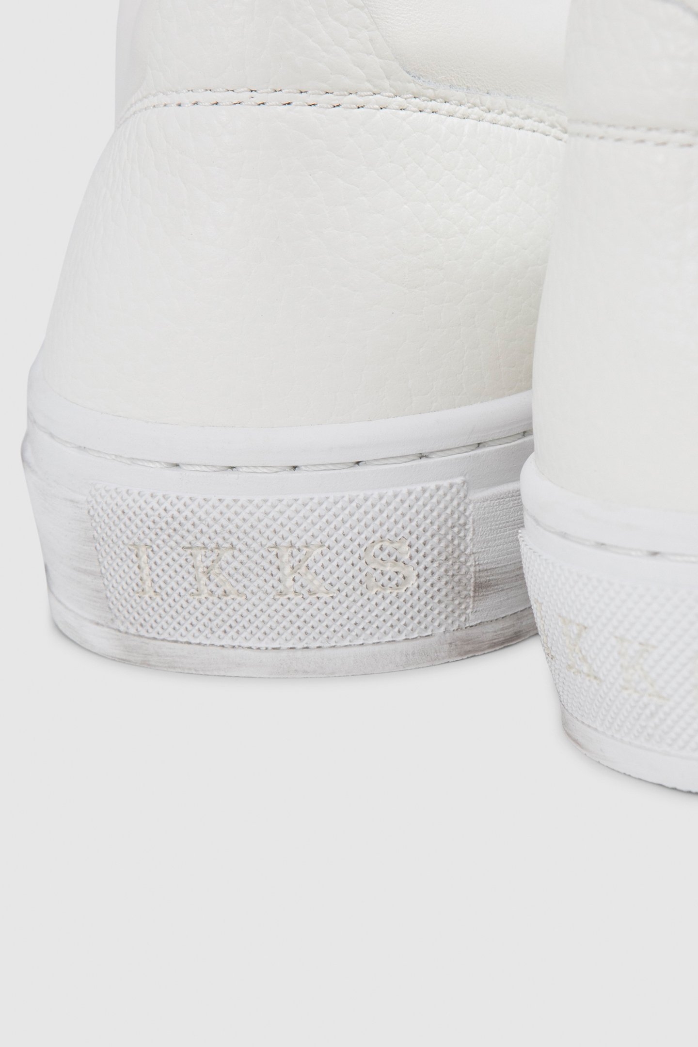 WOMEN’S WHITE LEATHER K STUDDED TRAINERS 7