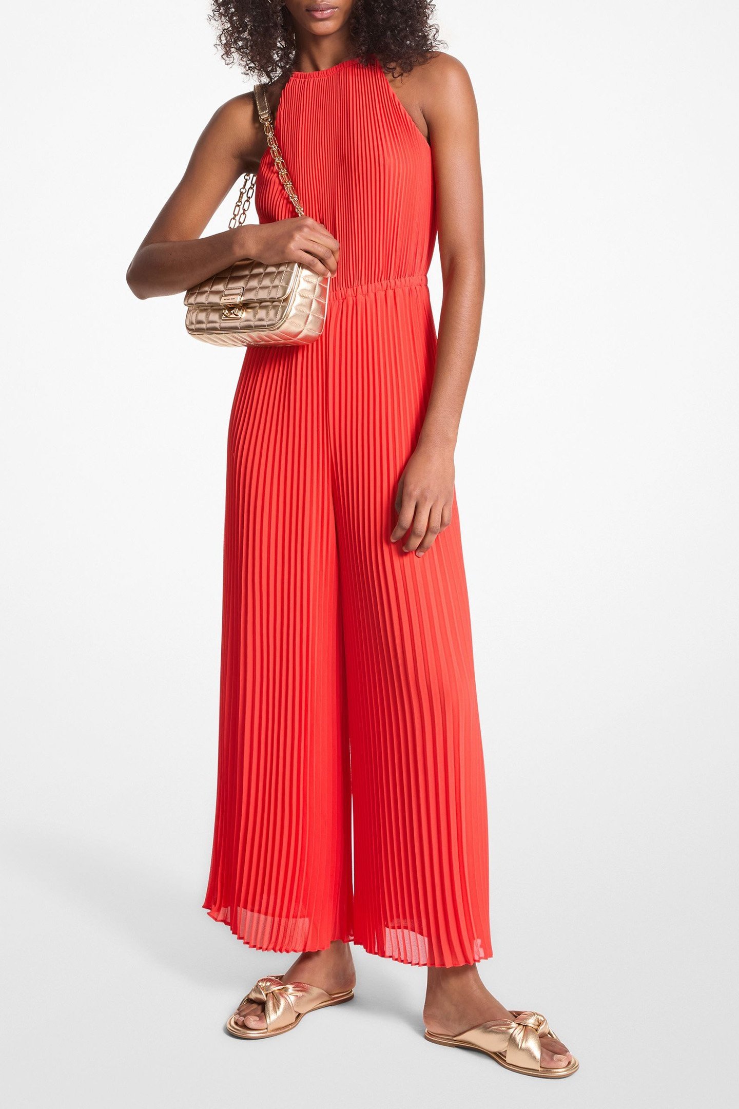 PLEATED HALTERNECK JUMPSUIT IN CORAL 1